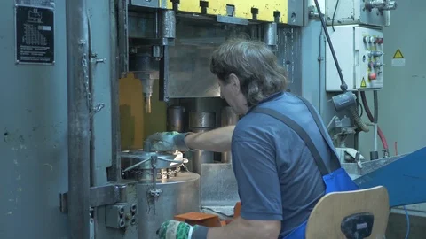 Man using cold forging machine Stock Footage 113461170