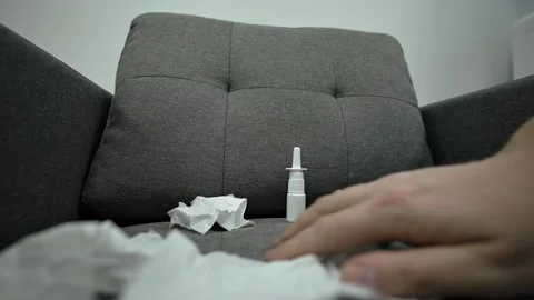 Man using cold spray to relieve the symptoms of an illness. Video stock 270522089