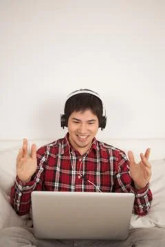 Man using the computer and celebrating 写真素材