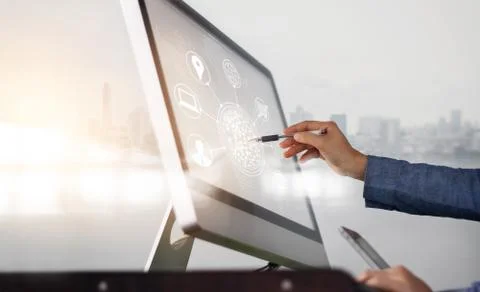 Man using computer and mobile payments online shopping and icon customer network Stock Photos