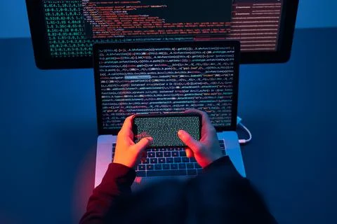 Man using computer and programming  to break code. Cyber security threat. I.. 写真素材