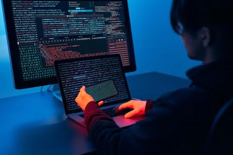 Man using computer and programming  to break code. Cyber security threat. I.. 스톡 사진