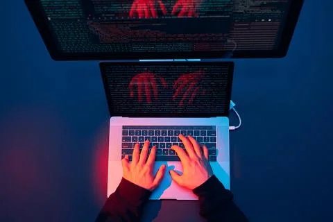 Man using computer and programming  to break code. Cyber security threat. I.. Foto stock