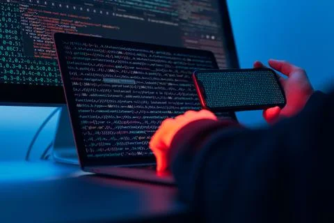 Man using computer and programming  to break code. Cyber security threat. I.. 写真素材