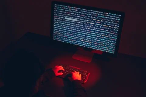 Man using computer and programming  to break code. Cyber security threat. I.. Foto stock