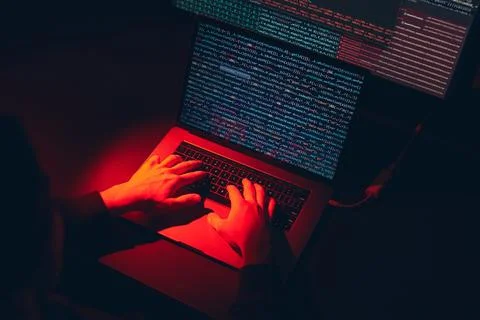 Man using computer and programming  to break code. Cyber security threat. I.. Foto stock