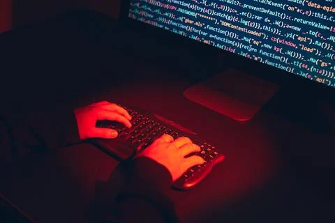 Man using computer and programming  to break code. Cyber security threat. I.. Foto stock