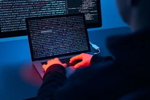 Man using computer and programming  to break code. Cyber security threat. I.. Foto stock
