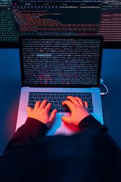 Man using computer and programming to break code. Cyber security threat. I... Foto stock