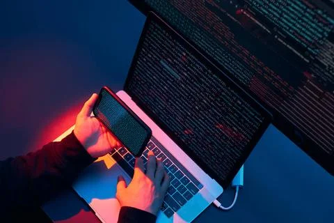 Man using computer and programming to break code. Cyber security threat. I... Foto stock