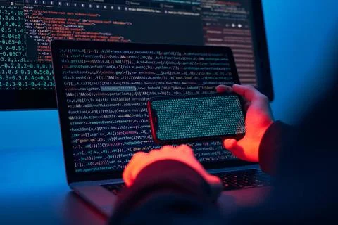 Man using computer and programming to break code. Cyber security threat. I... Foto stock