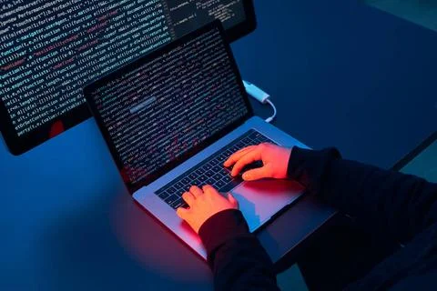 Man using computer and programming to break code. Cyber security threat. I... Foto stock