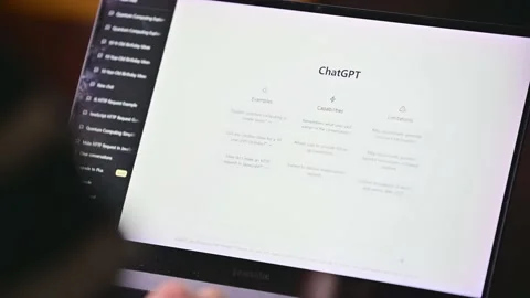 A man using a computer to ask questions to ChatGPT and seek answers Stock Footage 232921985