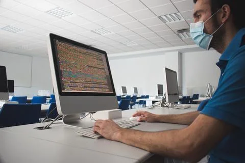 Man using a computer in a class Foto stock
