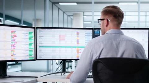 Man Using Computer To Code Medical Data Stock Footage 313747717