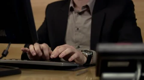 A man using a  computer Stock Footage 11298163