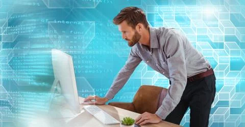 Man using computer with geometric code transition Foto stock