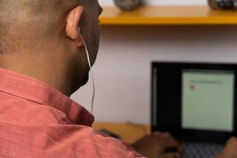 Man using the computer with headset Stock Photos