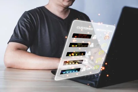 Man using computer laptop choose the happy smile face icon to give satisfac.. Stock Photos