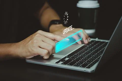 Man using computer laptop digital internet technology update software or prog Stock Photos