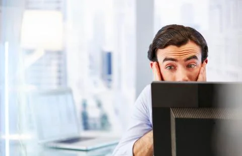 Man using computer in office,stressed and worried Stock Photos