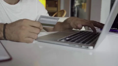 Man using computer for online purchase with credit card Stock Footage 83019624