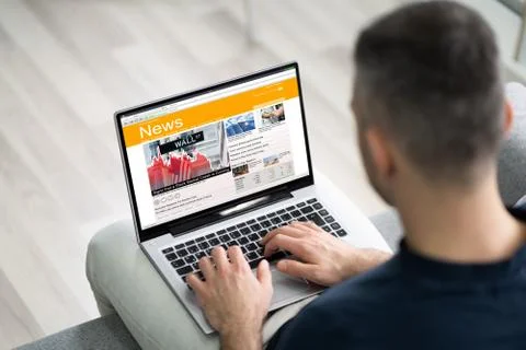 Man Using Computer Reading Electronic News Stock Photos