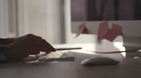 Man using computer, typing on keyboard Stock Footage 63611430