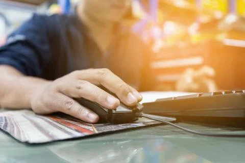 Man is using the computer to work. Stock Photos