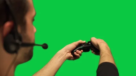 Man using controller on green screen Stock Footage 111345517