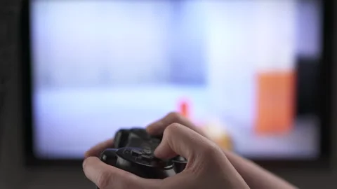 Man using a controller while playing co Video stock 196509721