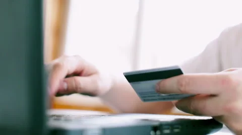 Man is using credit card and laptop  for online payment. FullHD video Stock Footage