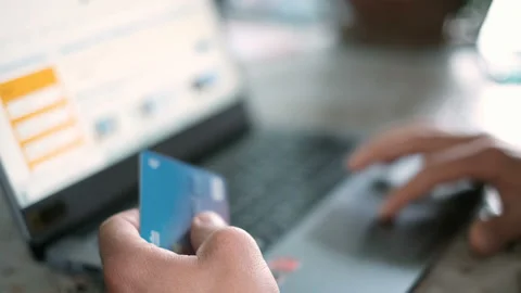 Man using credit card for casual shopping on laptop,web pay,tech e-commerce Stock Footage 144223742