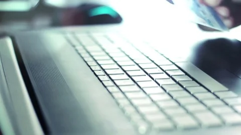 A man using credit card on-line, close-up shooting Stock-Footage 73795412