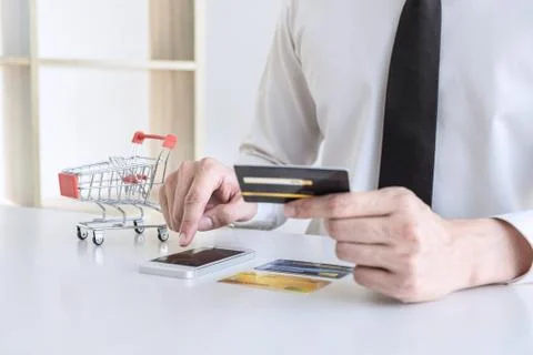 Man using credit card register security code payments online shopping and cus Stock Photos