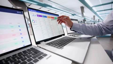 Man Using CRM Software On Laptop Stock Footage 326054274