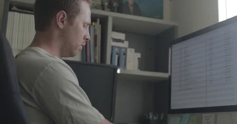 Man using desktop computer in home office Stock Footage 78037243