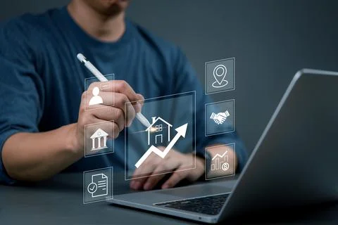 Man using digital pen to visualize real estate market trends, drawing growt.. Stock Photos