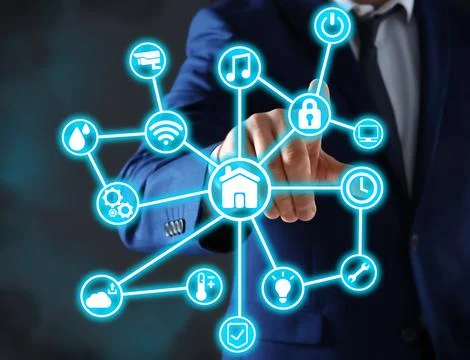 Man using digital screen with Smart Home interface on dark background, closeu Stock Photos