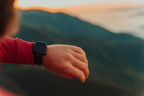 Man Using A Digital Smartwatch During Workout. Closeup View Of Man's Hands Stock-Fotos