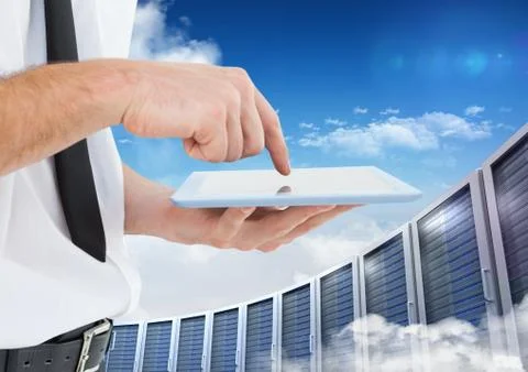 Man using digital tablet against office building in background Fotos de archivo