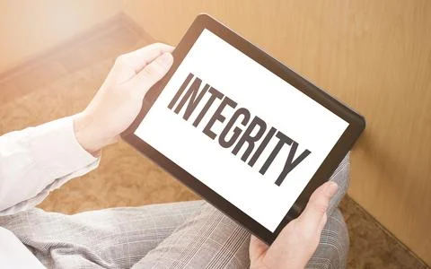 Man using digital tablet, close-up, coffee and keyboard on the background. Te Foto stock