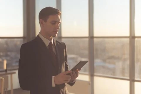Man using digital tablet at his working place Fotos Stock