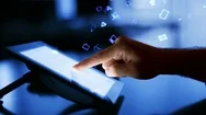Man Using A Digital Tablet With Holographic App Icons Flying From It. Blue. Stock Footage