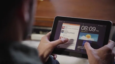 Man using digital tablet at home Stock Footage 83185037