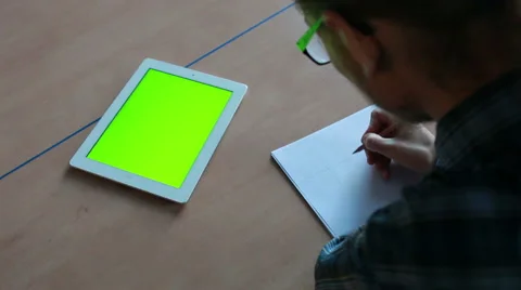 Man using a digital tablet in office Stock Footage 45795189