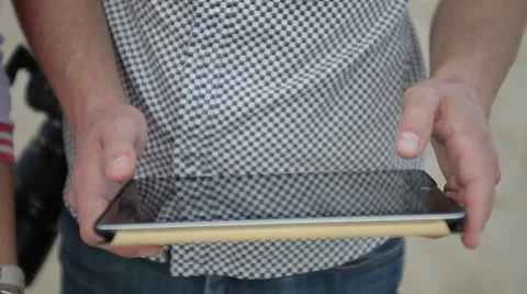 Man using digital tablet outdoors Stock Footage 45796061
