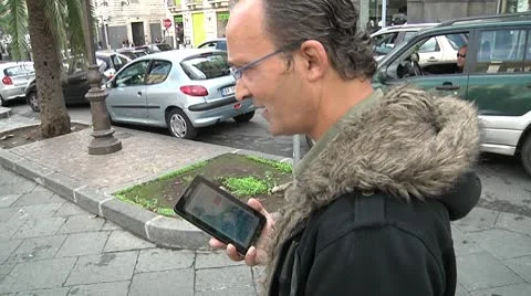 Man using digital tablet for phone call. Stock Footage 10725599