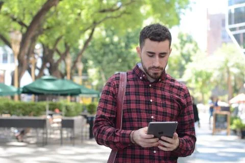 Man using digital tablet. Stock Photos