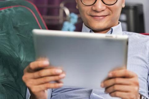 Man using a digital tablet Stock Photos